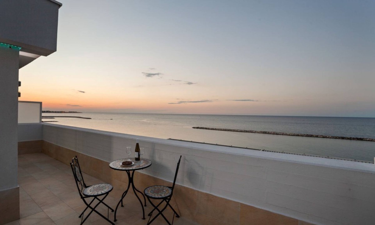 Municipio 3 Apartment | GuestHost - Modern apartment of about 50sqm, with a wonderful terrace of 70 sqm with a view on sea and lighthouse, able to accommodate 4 people with every comfort. The property is located in an enviable position, facing the beach and only 6 km from the a