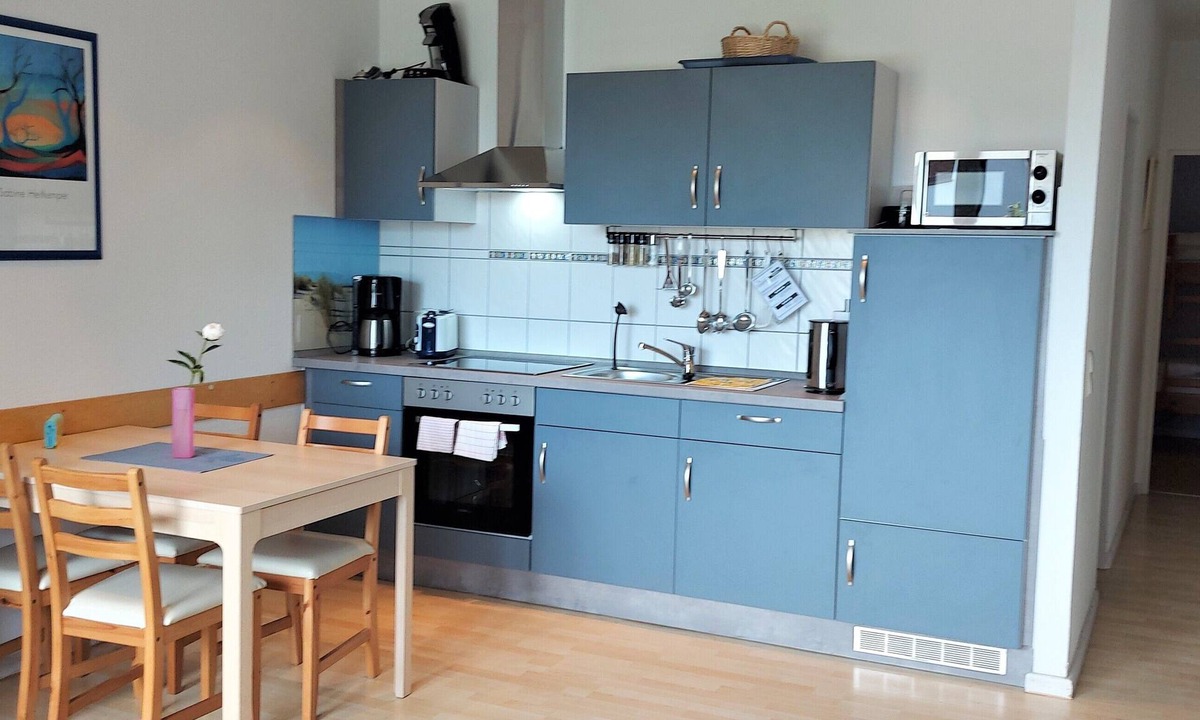 Eckwarden Apartment | Vacation home Herter, WiFi, gr. Garden, play equipment, lounger/play area, barbecue