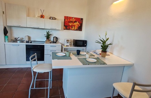 S'oru e Mari Apartment | A delightful section of a villa surrounded by greenery and just a stone's throw from the sea