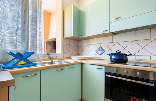 Buggerru Apartment | GuestHost - Cozy 70 sq m apartment, perfect for six people, located on the mezzanine floor of a small condominium.The property is located in Buggerru, approximately 1.4 km from Buggerru Beach and 7 km from Cala Domestica Beach. The area is conveniently l