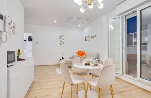 Municipio 3 Apartment | GuestHost - Modern apartment of about 50sqm, with a wonderful terrace of 70 sqm with a view on sea and lighthouse, able to accommodate 4 people with every comfort. The property is located in an enviable position, facing the beach and only 6 km from the a