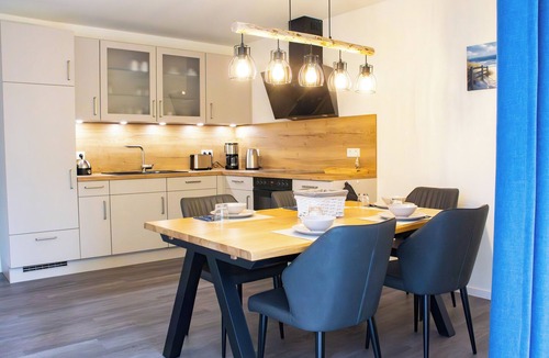 Tossens Apartment | Haus Nordmöwe - close to the beach. Sauna. South-west facing terrace. Dogs welcome.