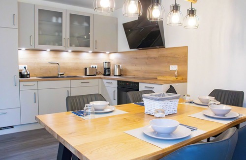 Tossens Apartment | Haus Nordmöwe - close to the beach. Sauna. South-west facing terrace. Dogs welcome.