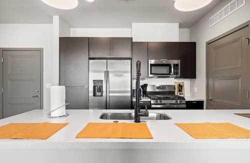 La Buena Vida Apartment | Spacious Westgate CozySuites by stadium with pool 1