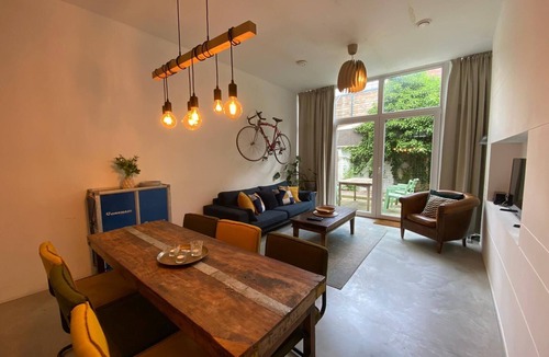 The Hague Center Condo | Unique open and bright apartment near the center, designed by the architect