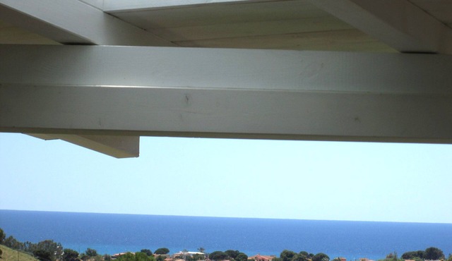 Comfortable apartment with terrace overlooking the sea, near Villasimius