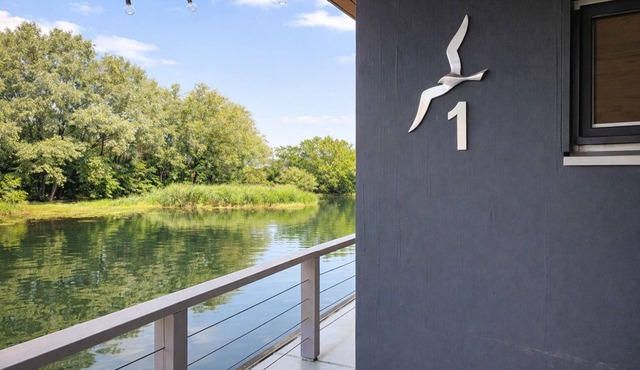 Floatinghouse Möwe 1: Lake view, terrace & fireplace on 116 sqm