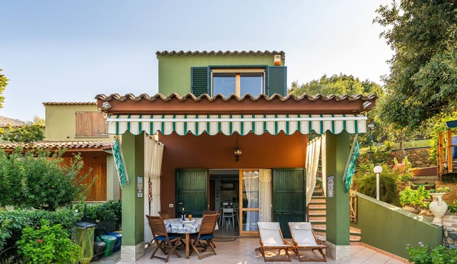 Holiday Home "Villetta Anna a Porto Sa Ruxi" with Sea View, Shared Pool & Wi-Fi