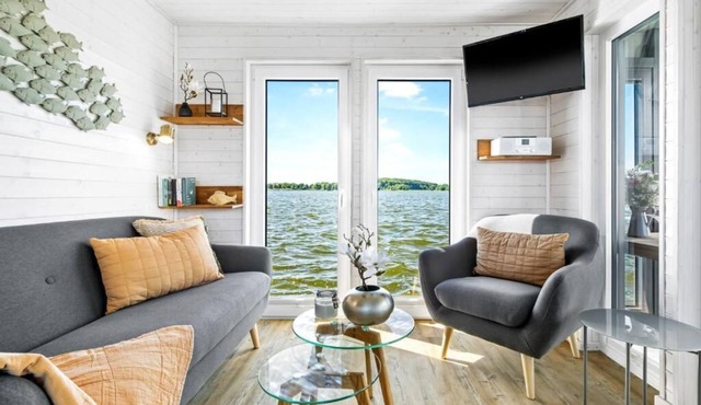Houseboat moments of happiness for 4 people with roof terrace on the Baltic Sea fjord Schlei