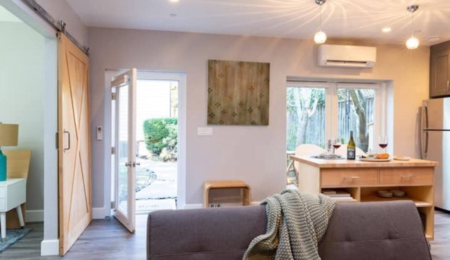 Modern Garden View Home w/free parking, unique art & furniture: a Superhost