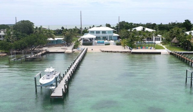 Private Beach Bayside 6 Bedroom Resort Home with Pool, Dock, & Garage