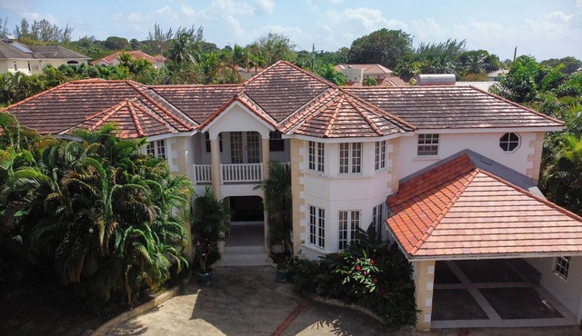 Spacious 5-bedroom house in soothing Bridgetown with AC