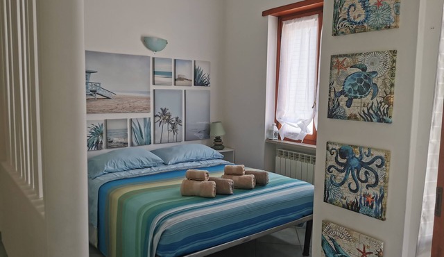 Two-room mini apartment a stone's throw from the sea with parking space