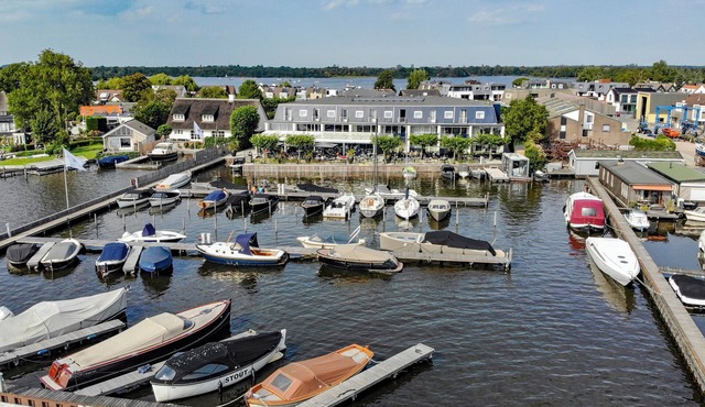 Waterfront Stay with Private Marina Access, Biking Trails and Lakeside Dining