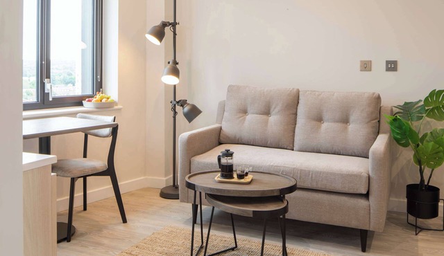 Workspace & Gym with Skyline View : StayCozy