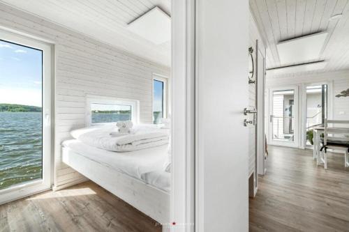 Hausboot Glücksmomente mit Dachterrasse in Schleswig am Ostseefjord Schlei